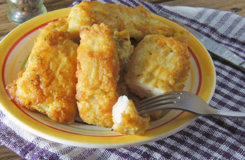Flaky fish provides omega-3 fatty acids that naturally reduce swelling after a root canal.