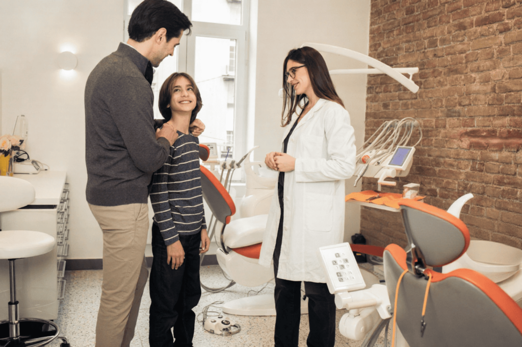 A father and a dentist explain thoroughly what happens during a pediatric filling for his son.